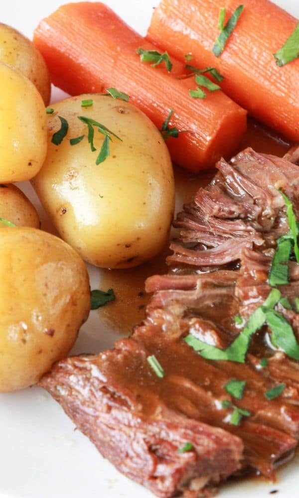 plate with potatoes, carrots of beef