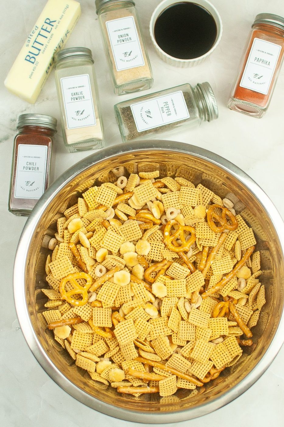 cereal mixure in a metal bowl on table