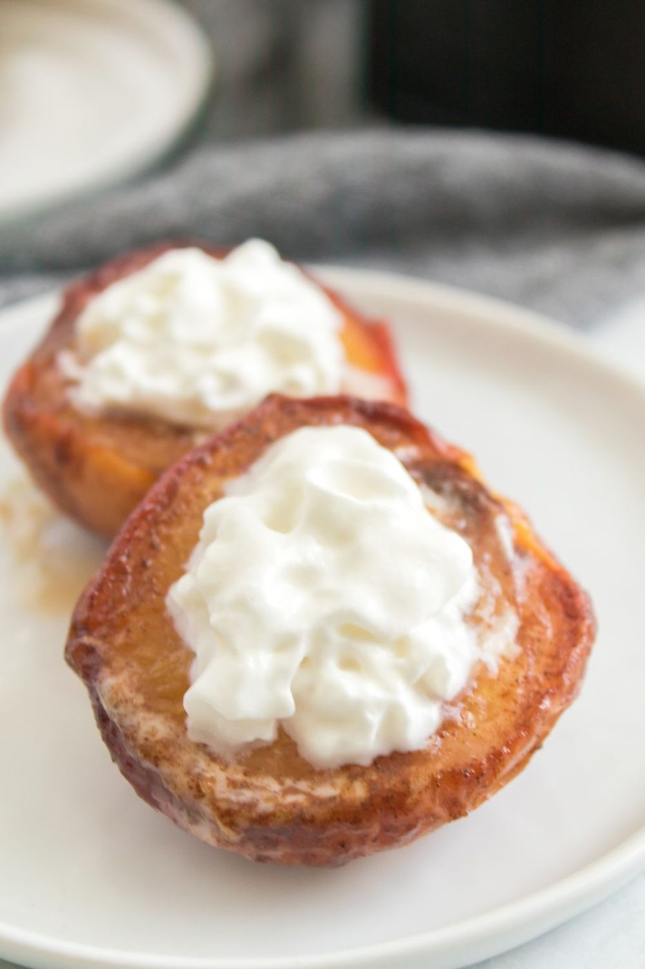peaches with whipped cream on top 