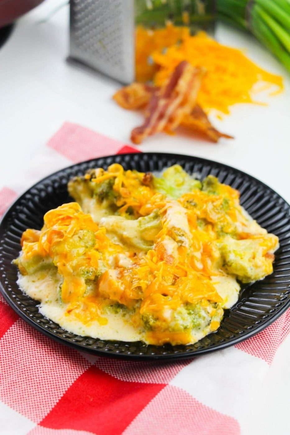 side view of the broccoli cheese casserole on a plate 