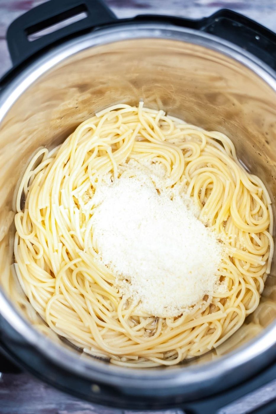 pasta with cheese in the center of pressure cooker on counter