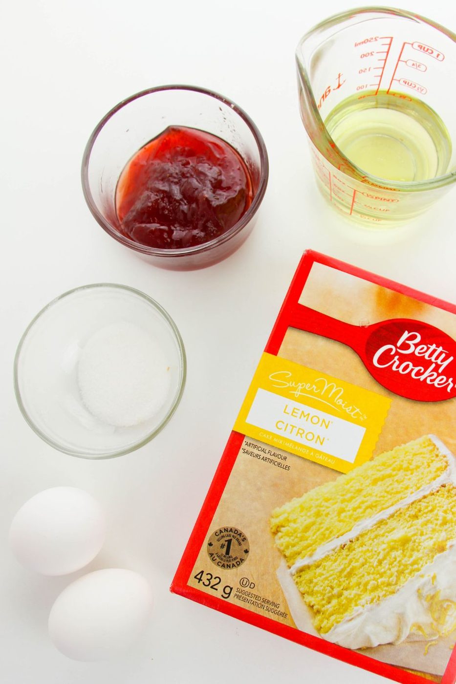 ingredients for cake mix cookies on a white counter