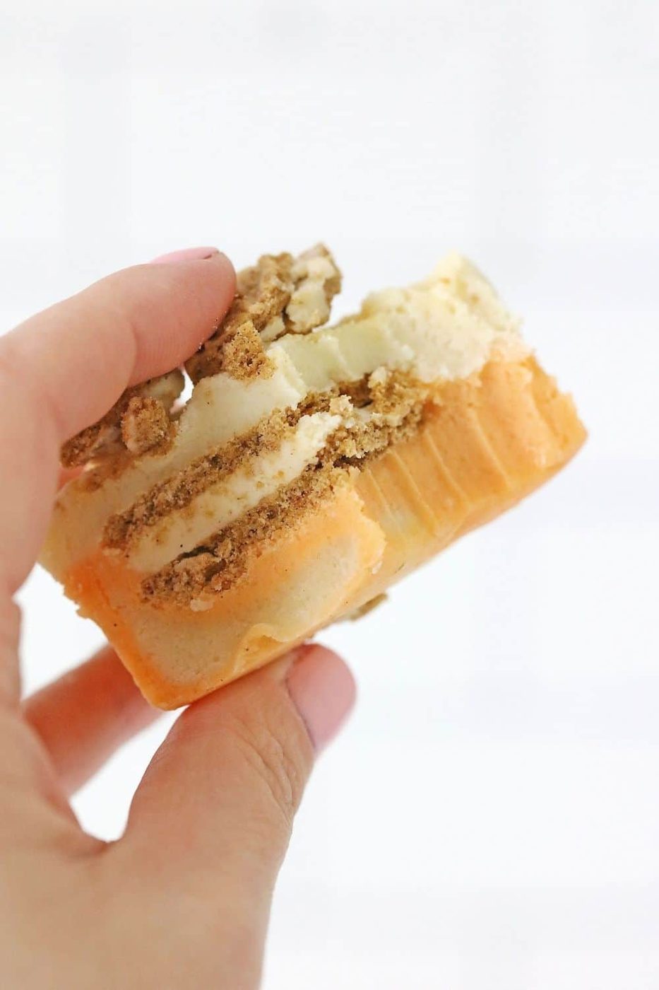 holding a slice of carrot cake fudge in hand