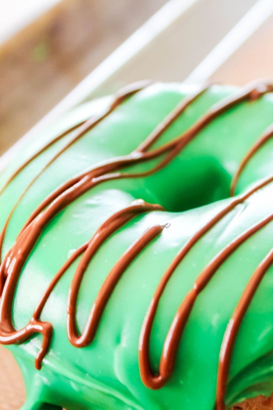 baked chocolate donut on baking sheet 