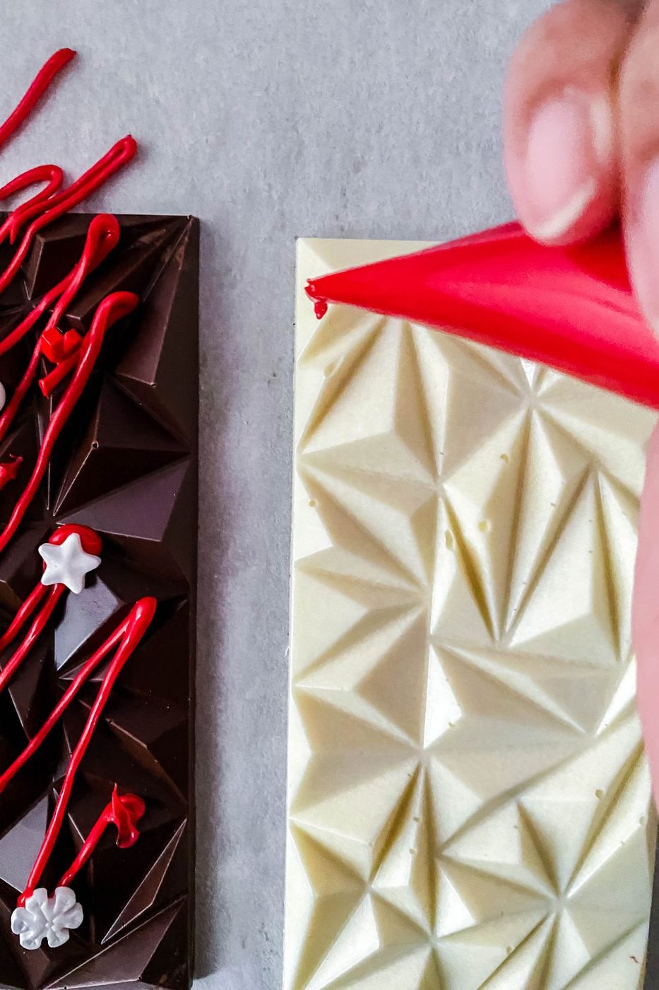 decorating white chocolate with red chocolate