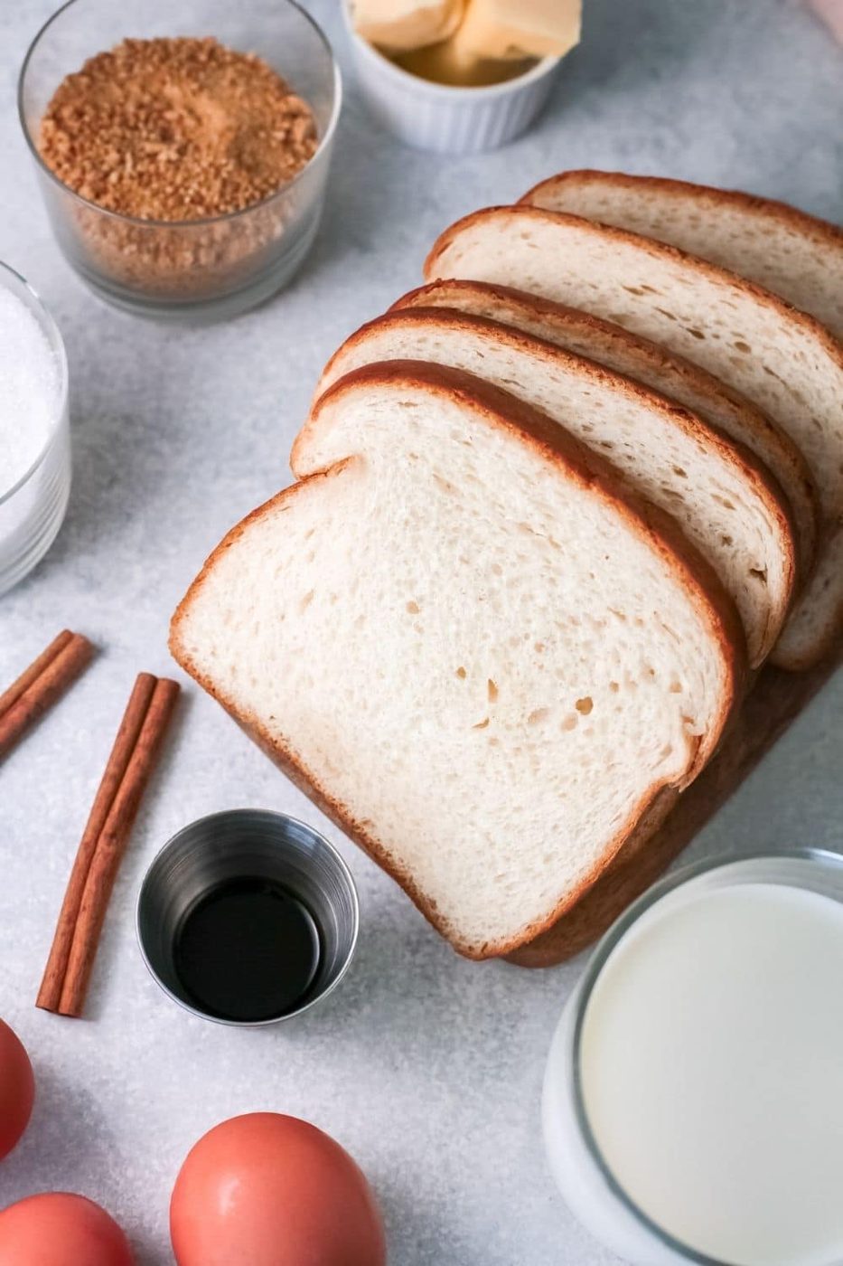 ingredients for french toast on marble counter