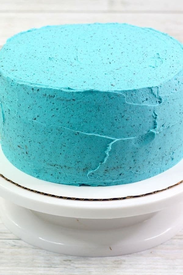 blue cake on a cake stand