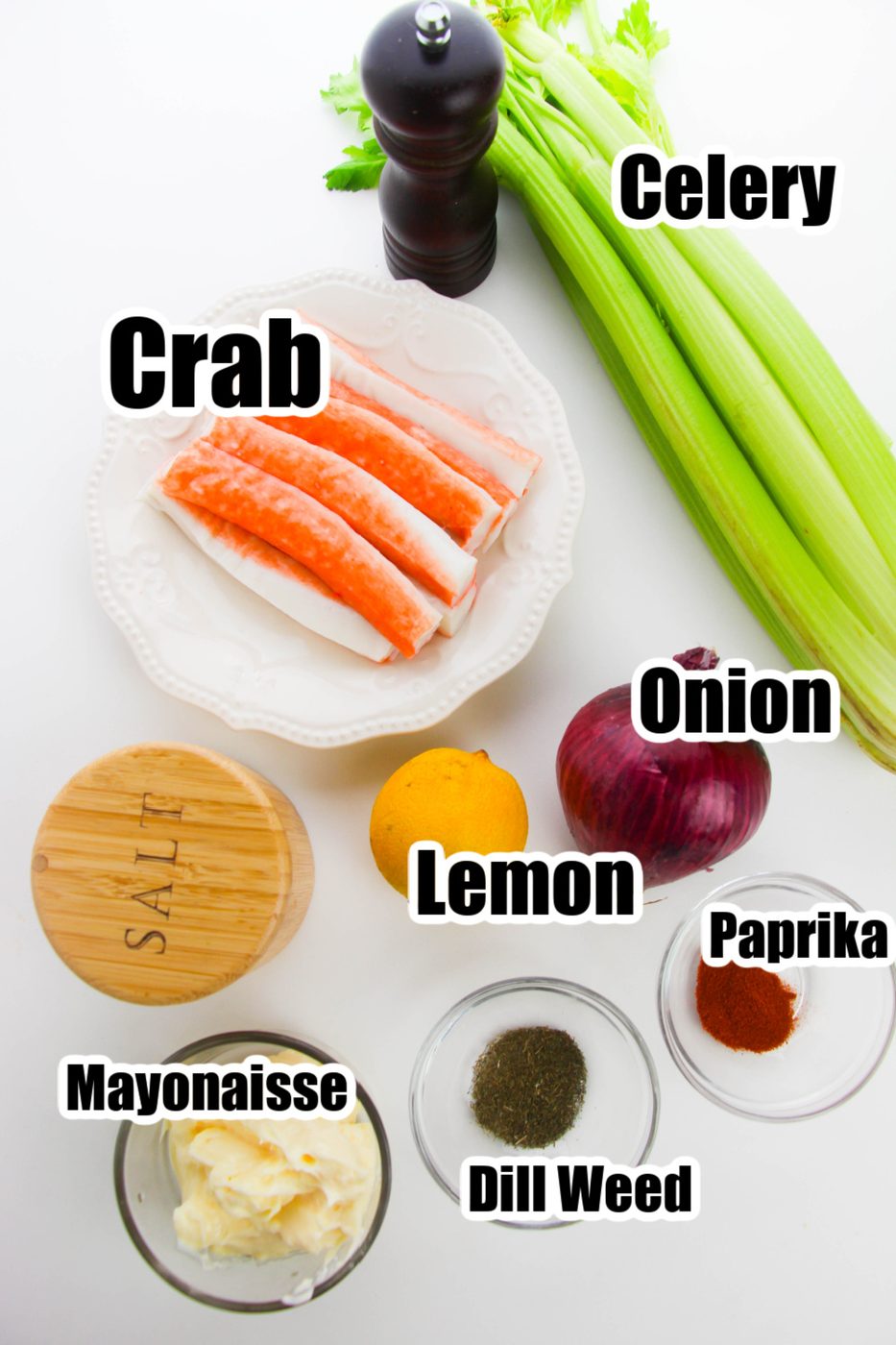 ingredients for crab salad on white counter