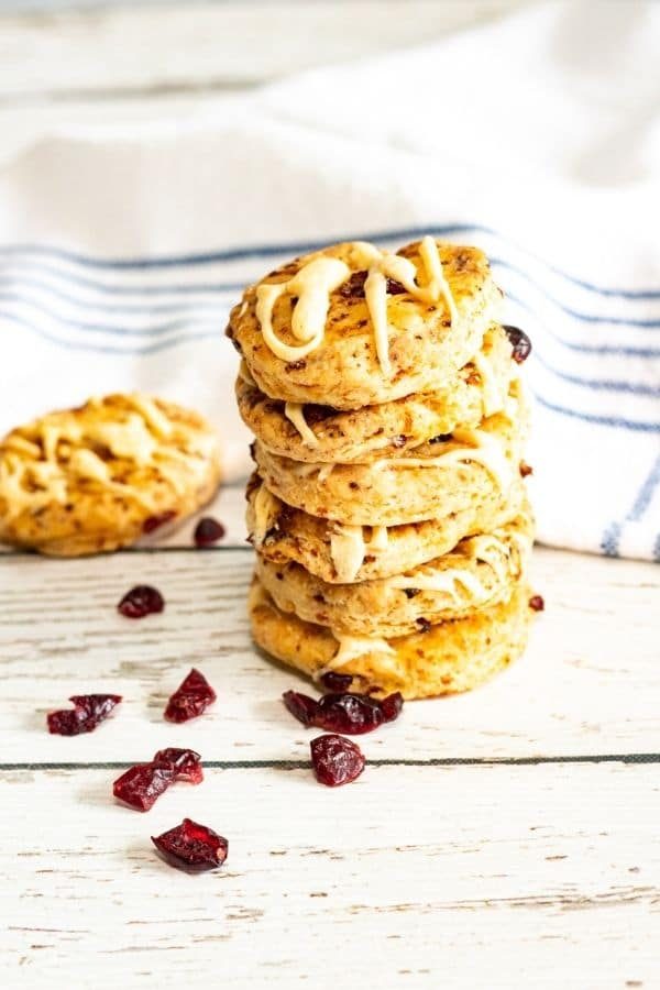 orange cookies stacked up on top of each other