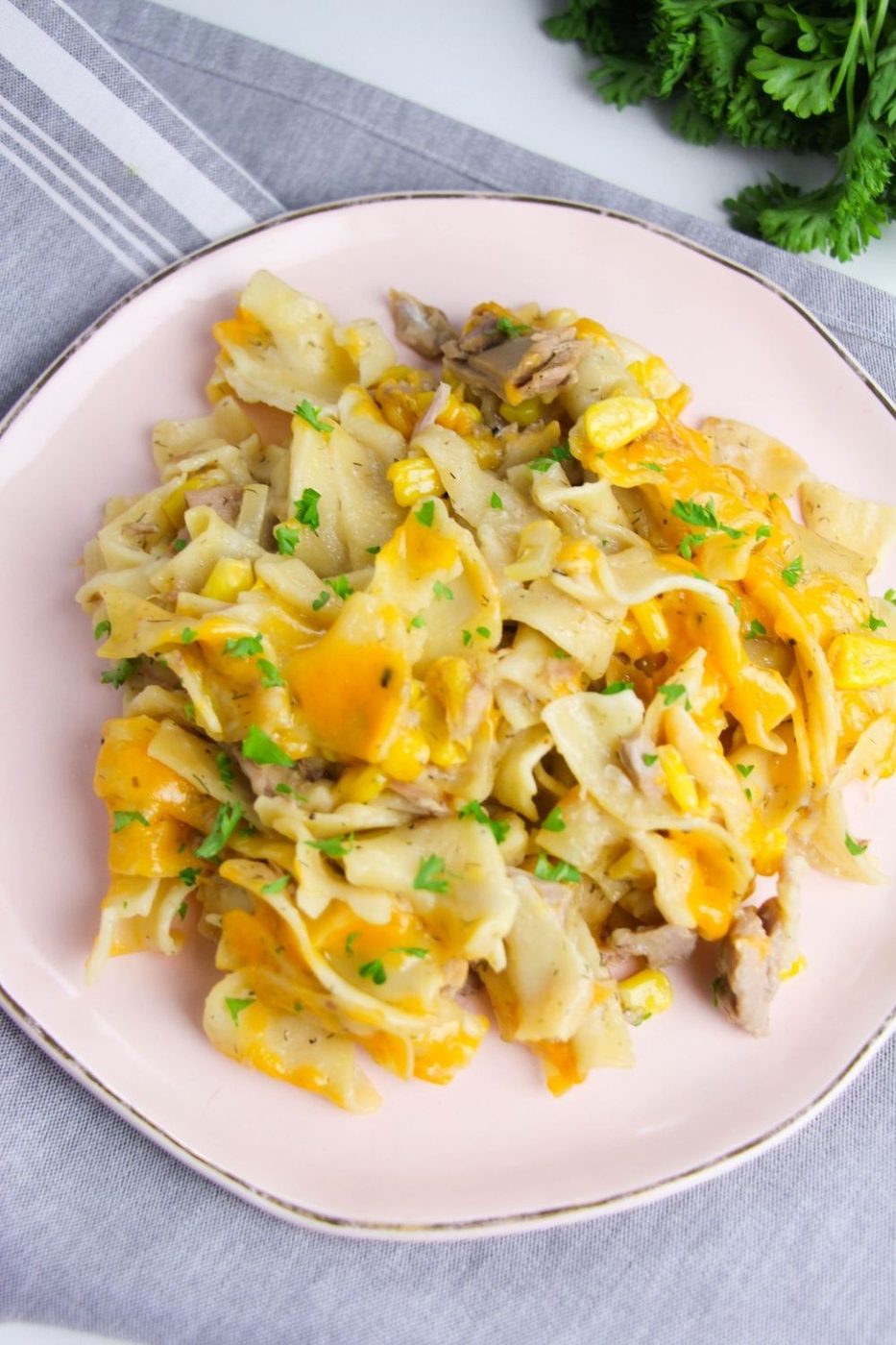 plate of tuna casserole with cheese on top