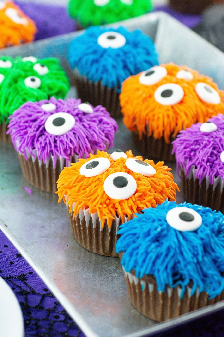 cupcakes on tray that are Halloween monster themed