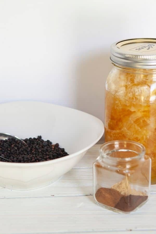 elderberry syrup on a table