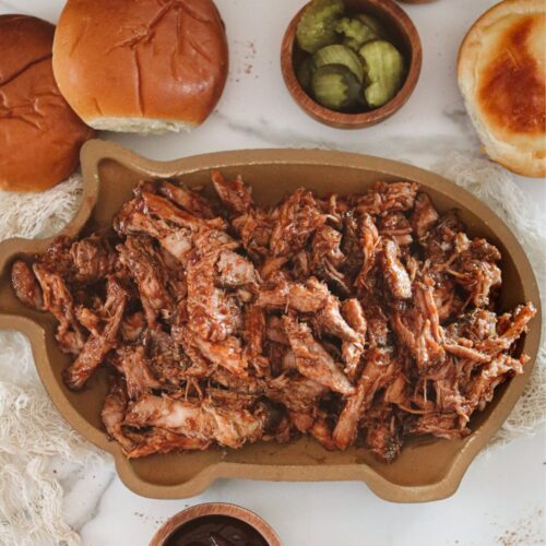 pig tray with pulled pork on the tray