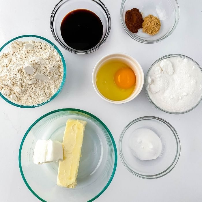 ingredients for gingersnap cookies on white counter
