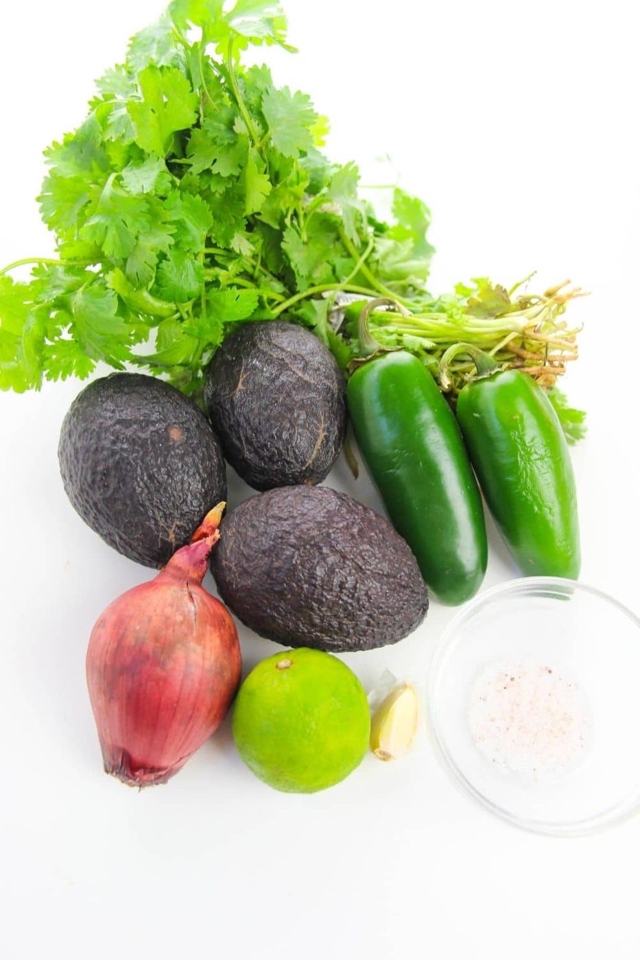 guacamole ingredients on white counter 