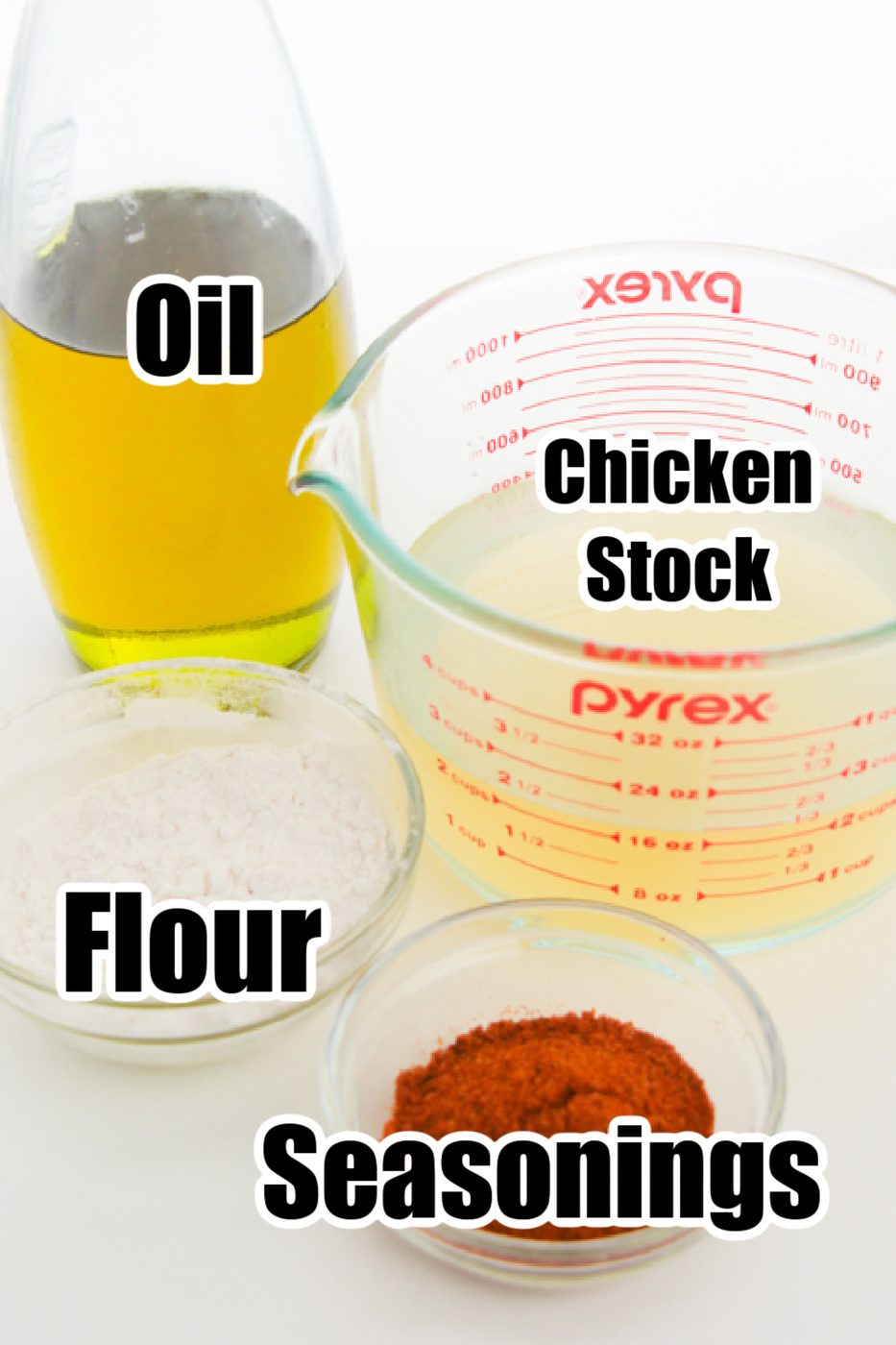 ingredients for enchilada sauce on white counter