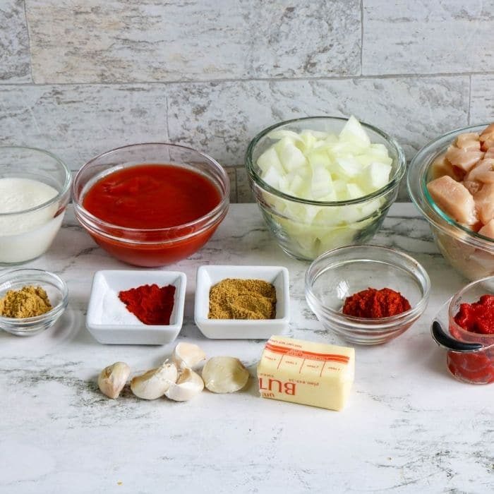 butter chicken ingredients on counter