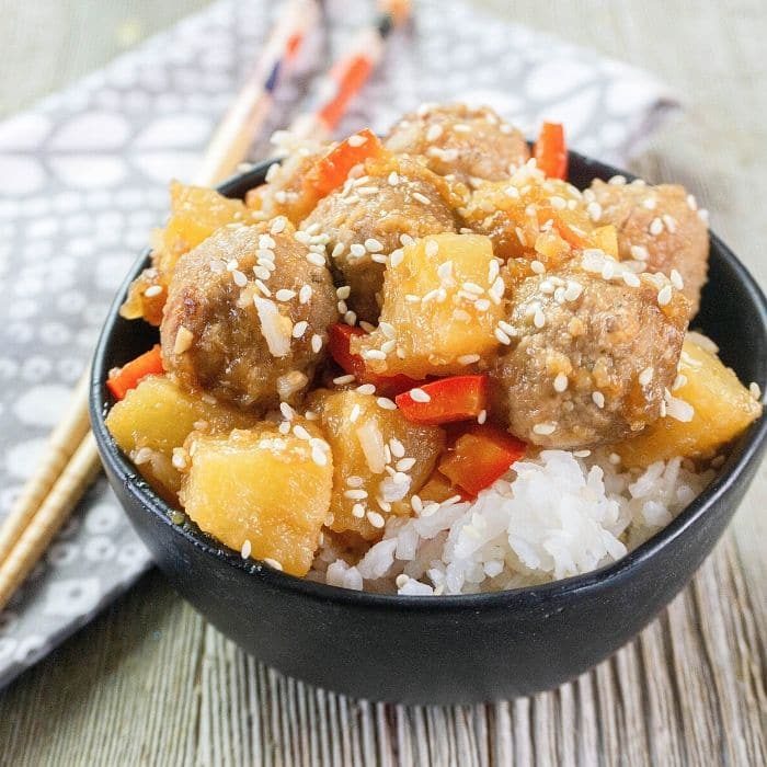 Hawaiian Meatballs in a bowl with rice