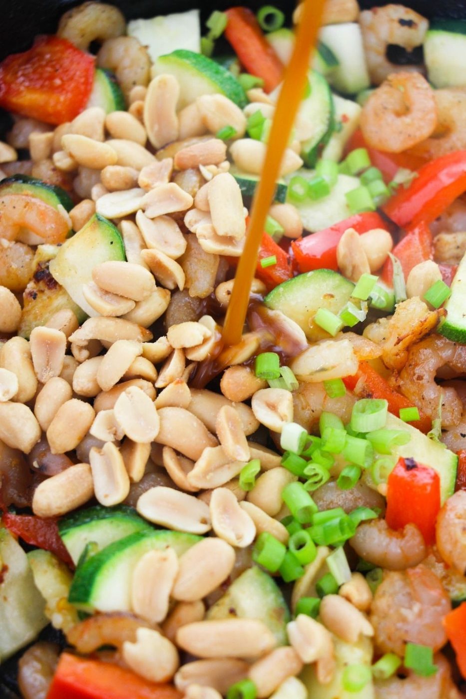 shrimp pao iwith sauce pouring in 