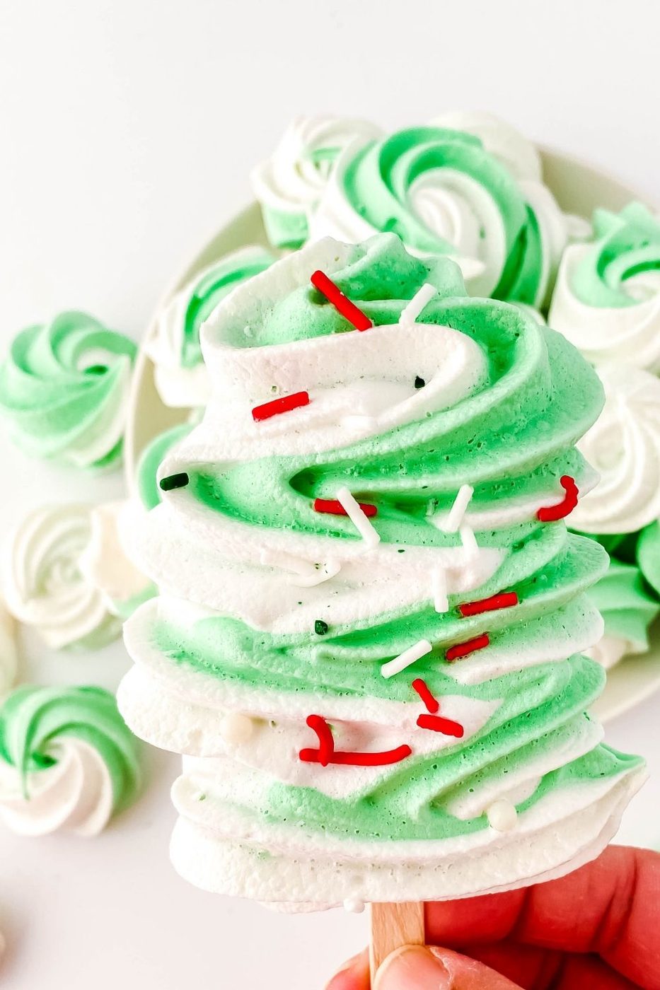 holding meringue pop