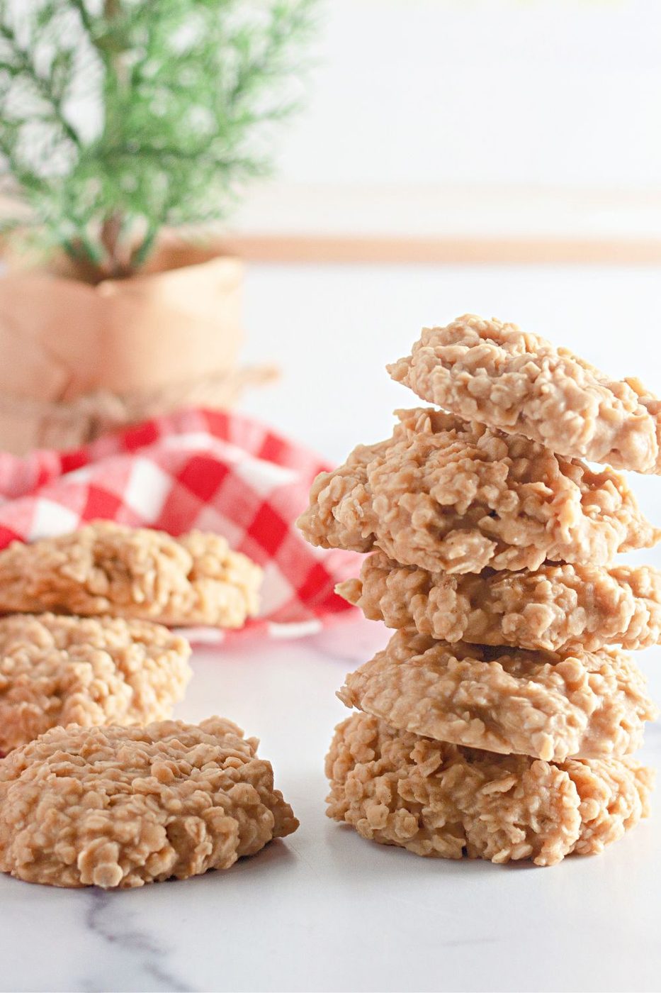 oatmeal peanut butter cookies stacked on top of each other on table