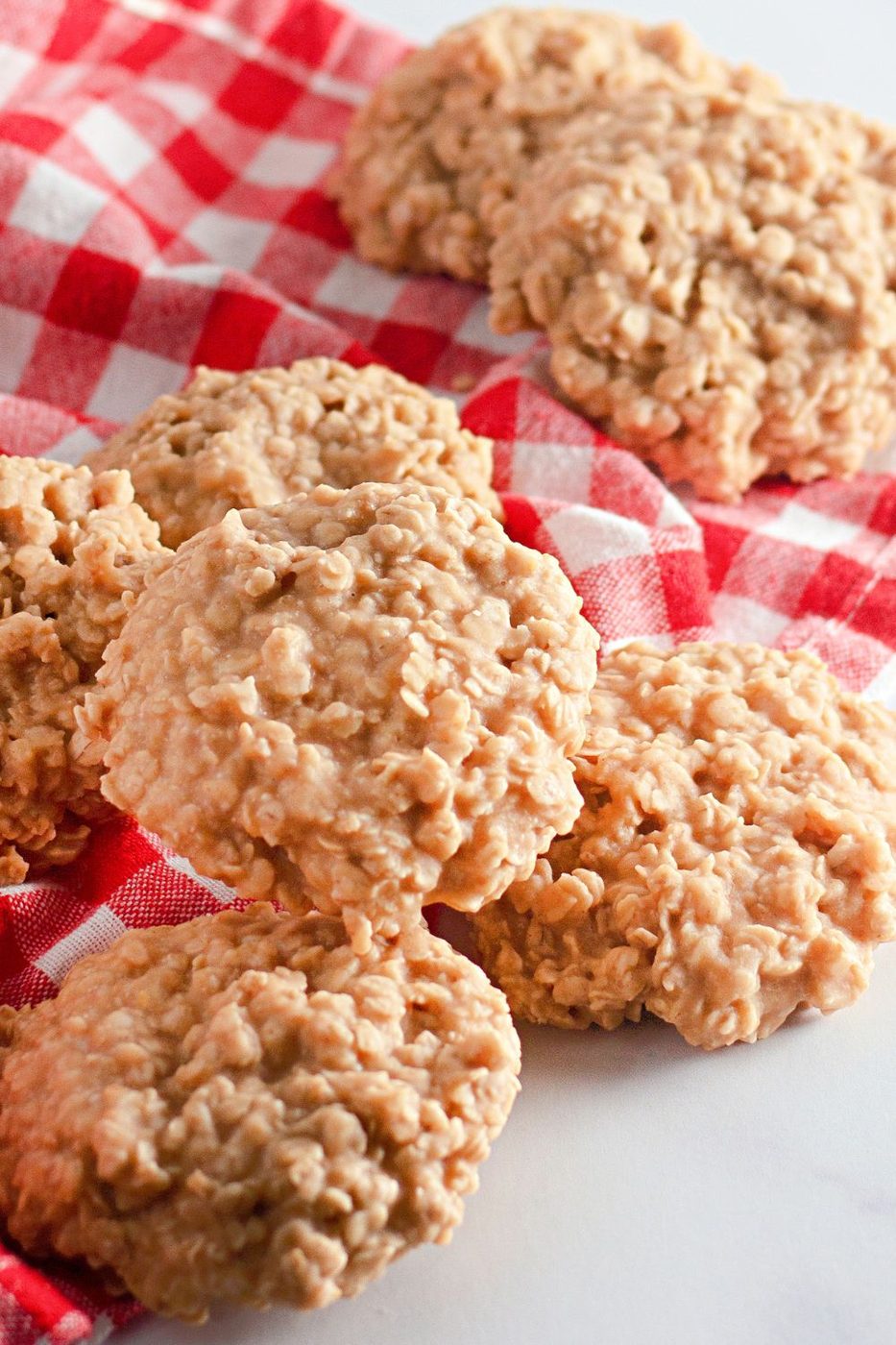 peanut butter cookies on table stacked up