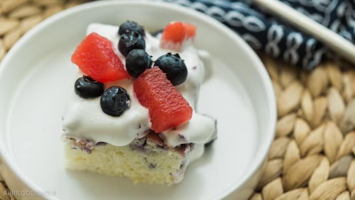 Watermelon Recipes - Watermelon blueberry poke cake- April Golightly