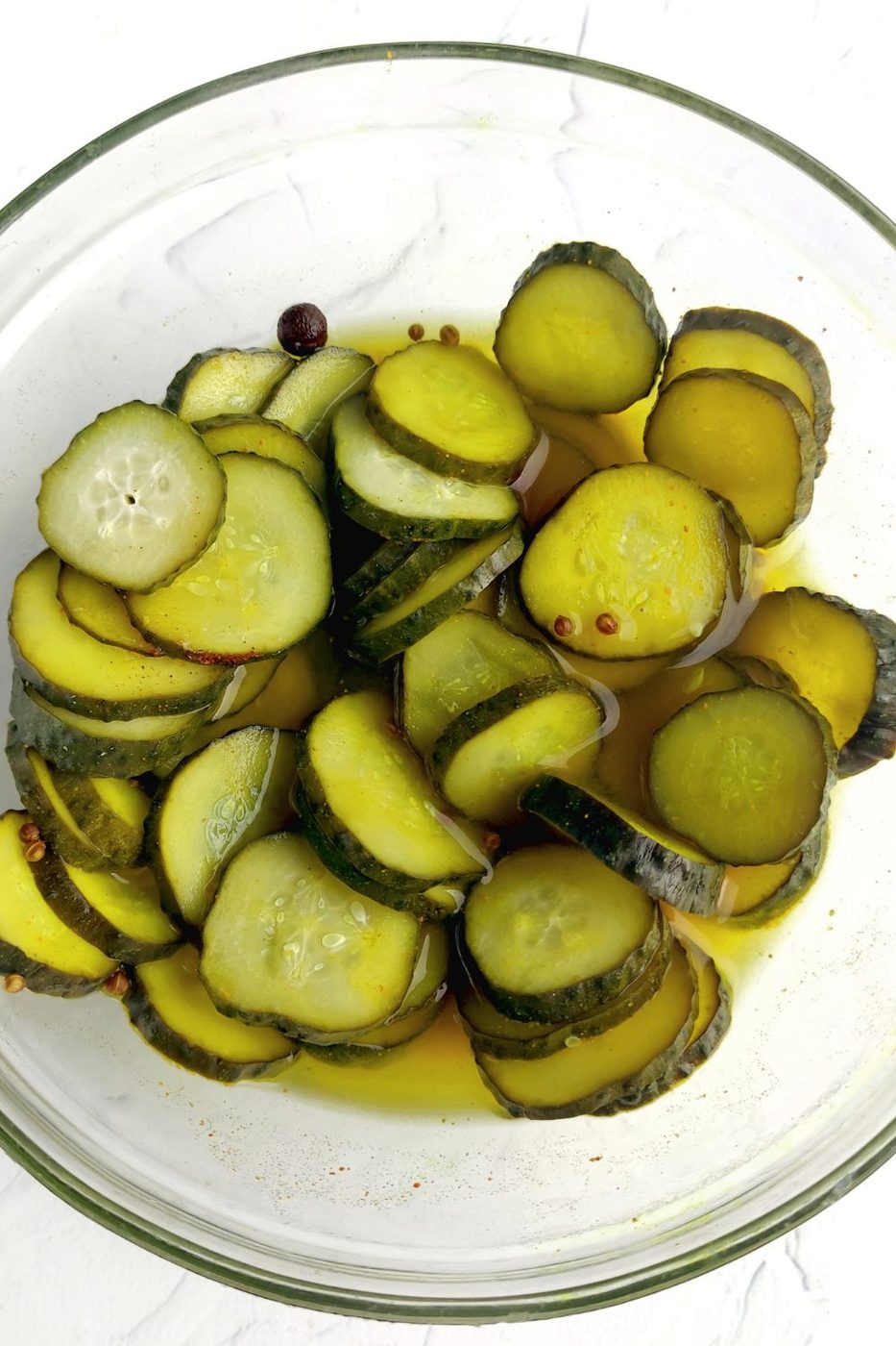 refrigerated pickles in a glass pyrex bowl