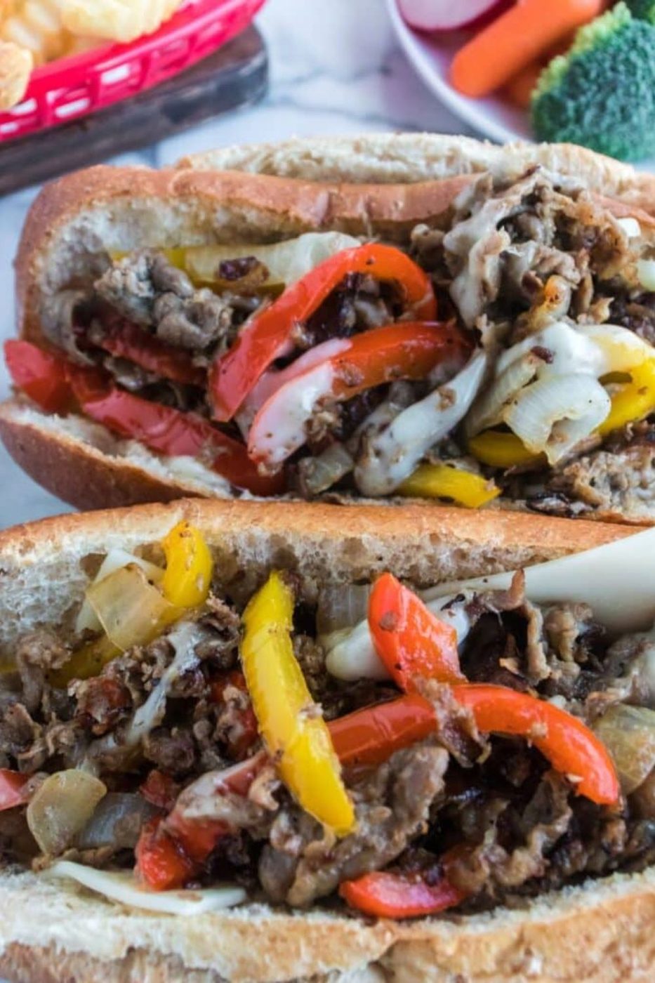 Skillet Shaved Steak on a Bunes on a table 
