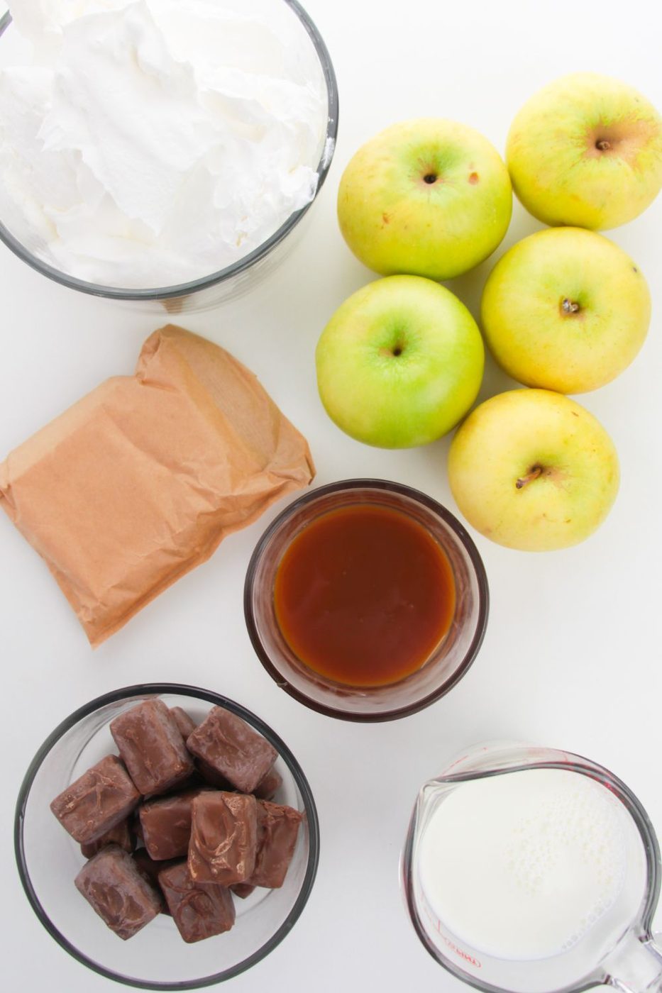ingredients for a snicker salad on white counter