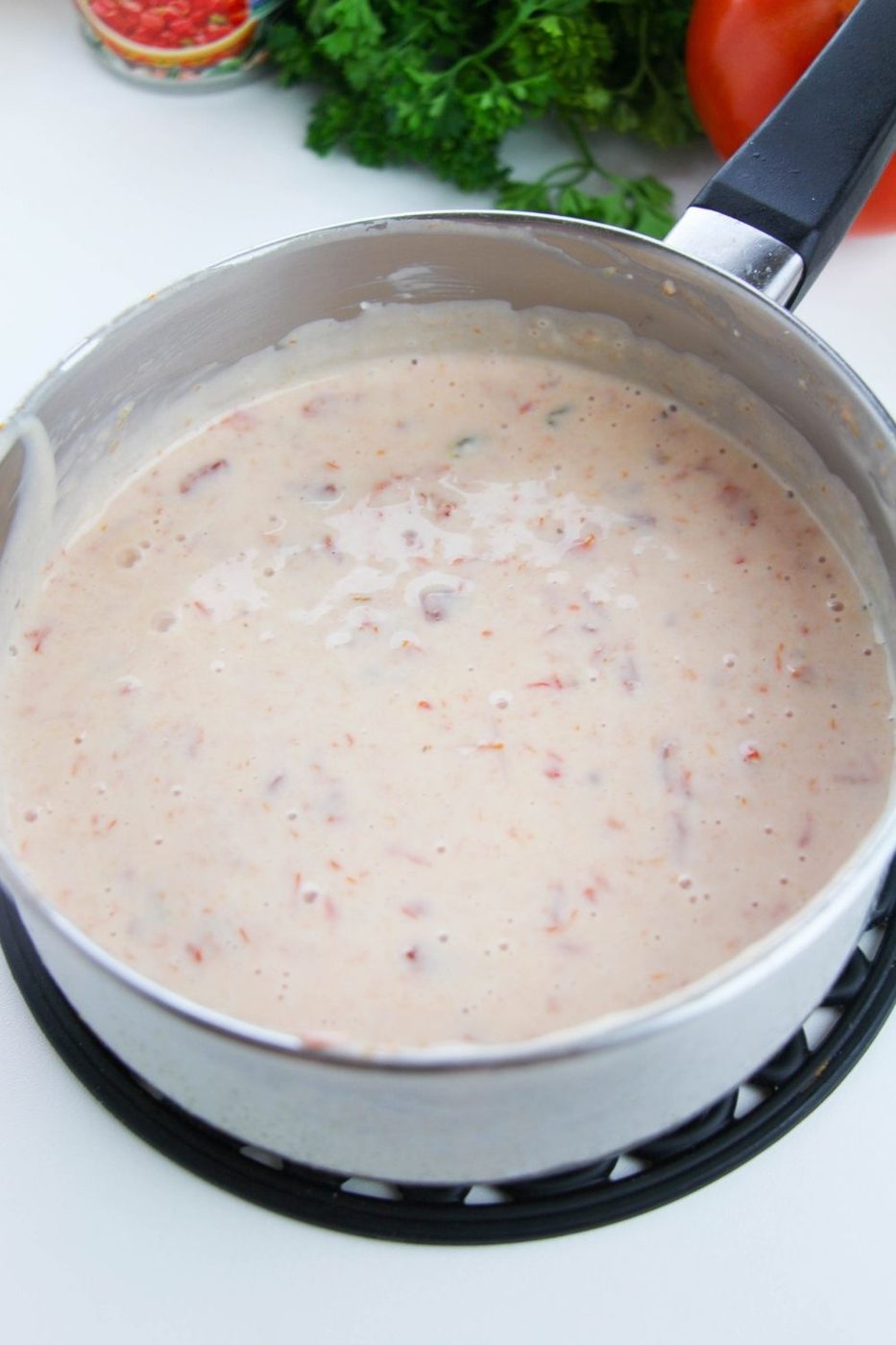pan with white velveeta cheese dip 