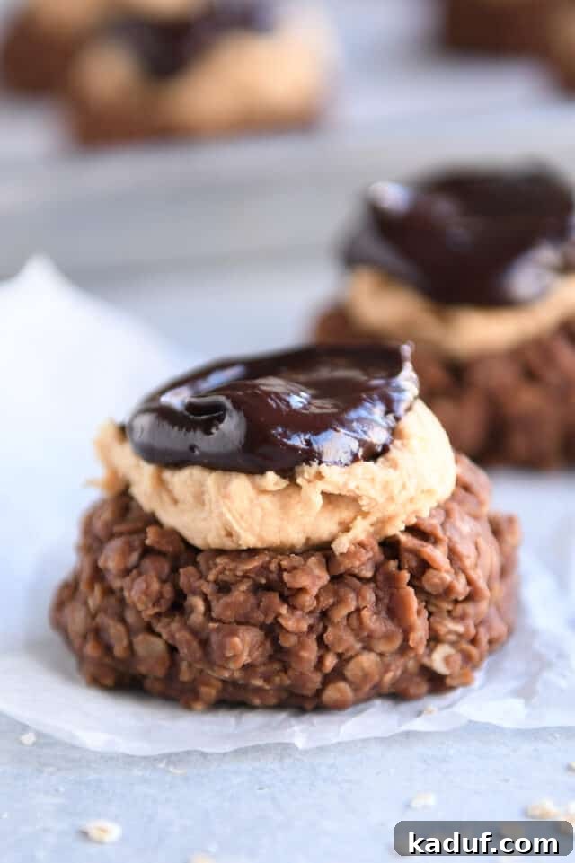 Decadent no-bake chocolate peanut butter buckeye cookie with visible layers on parchment paper.