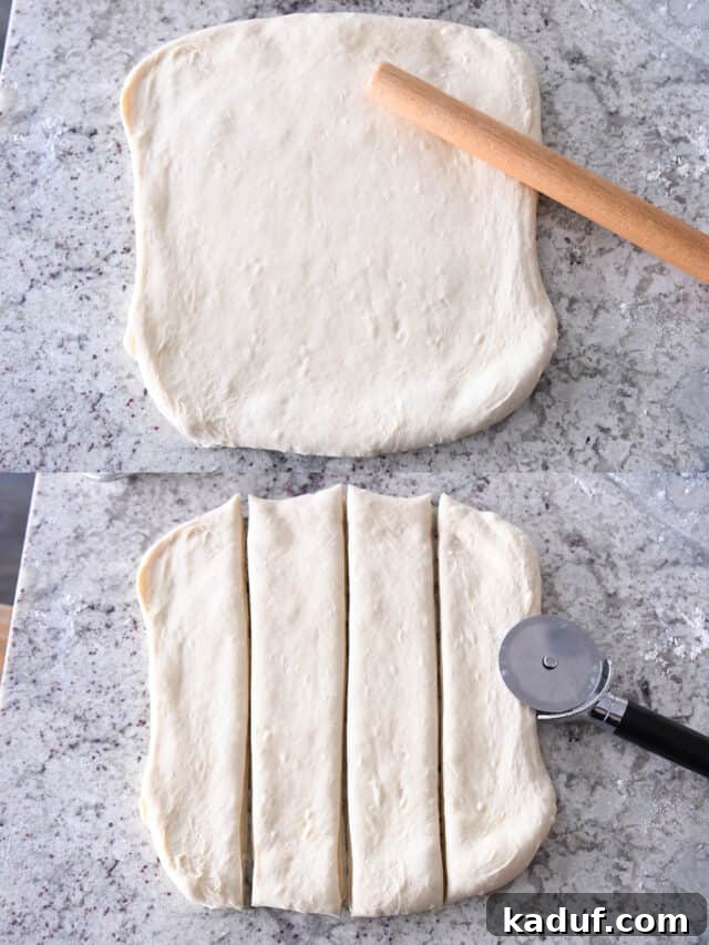 Effortless Twisted Croissant French Bread 10 Rolled out dough cut into four strips with pizza cutter.