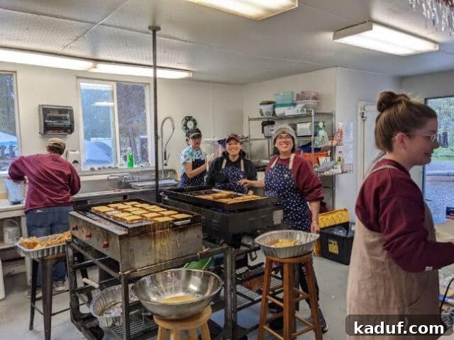 Camp Kitchen Secrets Menus Tips and Resources for Feeding Big Groups 3 Making French toast in camp kitchen.