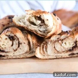 French Chocolate Swirl Bread 16 Three halves of chocolate croissant French bread.