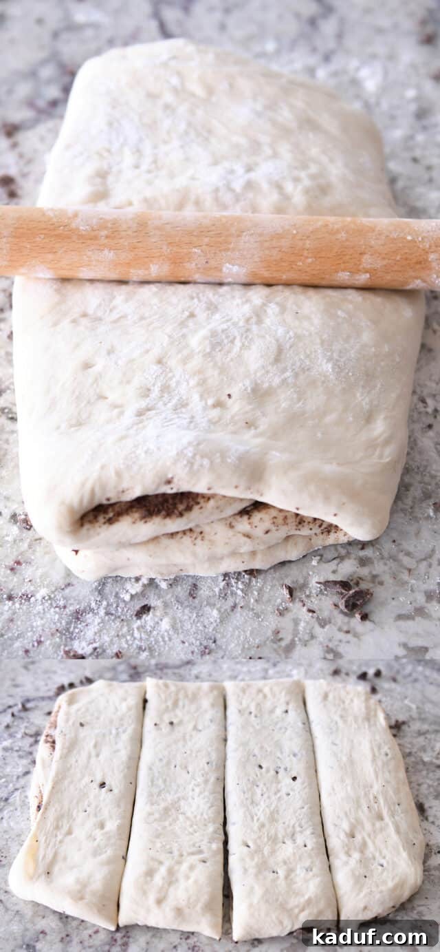 French Chocolate Swirl Bread 9 Process of rolling out chocolate-filled French bread dough into a square and then cutting it into four even strips for twisting.
