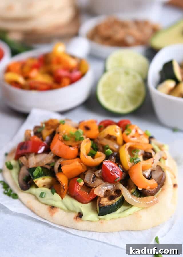 Garden Harvest Flatbread with Avocado Cream 7 Flatbread with creamy avocado sauce and roasted vegetables.