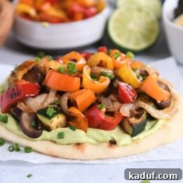 Garden Harvest Flatbread with Avocado Cream 9 Flatbread topped with creamy avocado sauce and roasted vegetables.