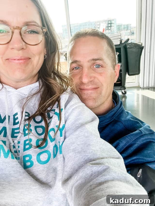 Weekend Contemplations 4 Husband and wife in hoodies, sharing a warm, candid moment.