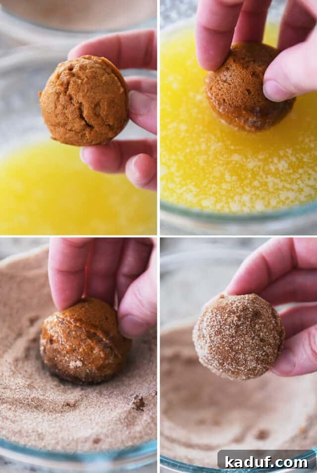 Pumpkin Donut Muffin Bites 8 A hand dipping a mini pumpkin muffin into melted butter, then rolling it in a bowl of cinnamon and sugar.