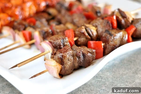 Juicy Steak and Vibrant Vegetable Skewers 2 A platter of grilled beef and vegetable kebabs ready to be served, showcasing vibrant colors and perfect char marks.