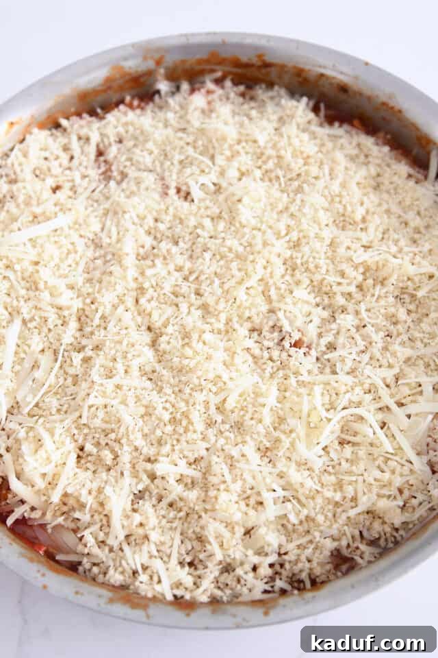 One-Pan Italian Cheesy Chicken and Zucchini 7 Pank bread crumbs and parmesan cheese on top of skillet meal.