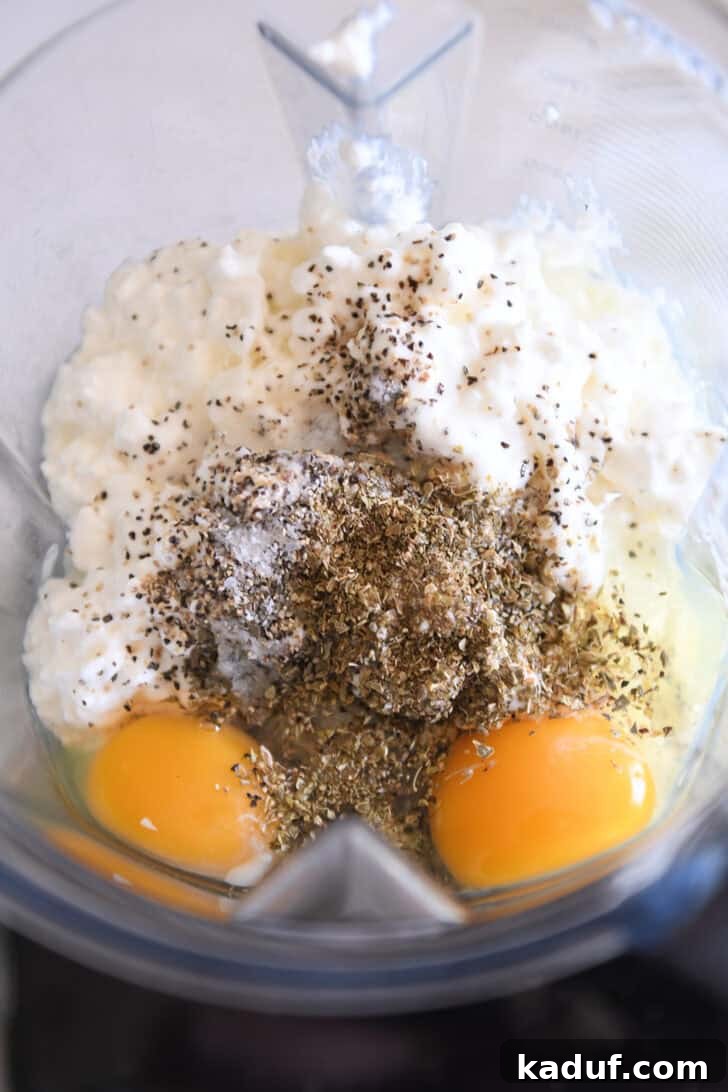 Hearty Dutch Oven Lasagna 3 Blender with cottage cheese, eggs, basil, oregano, salt and pepper for creamy filling.