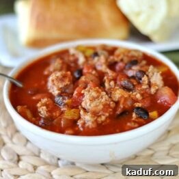 Close-up of a bowl of Hearty Turkey and Bean Chili, ready to be served and enjoyed.