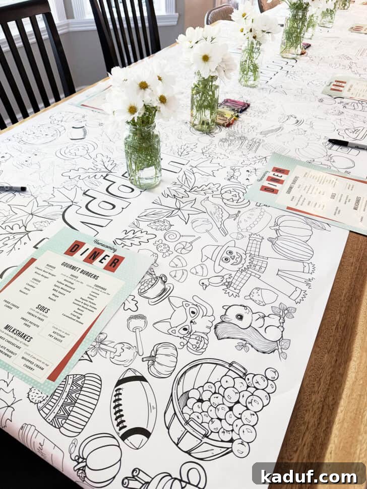 Friday's Frame of Mind 12 Long dining table set for a Homecoming dinner with a large coloring page banner and crayons