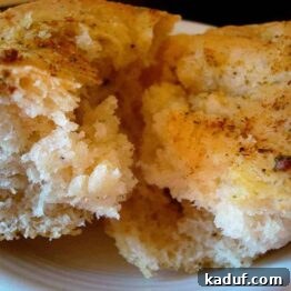 Thumbnail image of Blitz Bread, showing its herby crust.