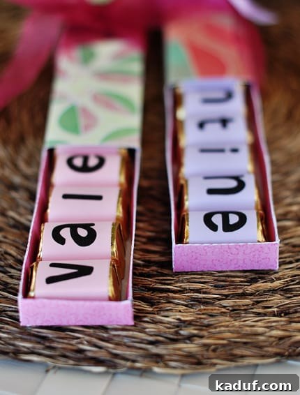 Homemade Valentine Chocolate Gift Boxes 3 two half opened homemade chocolate Valentine's Day boxes with wrapped chocolates inside, showing 'VALENTINE'