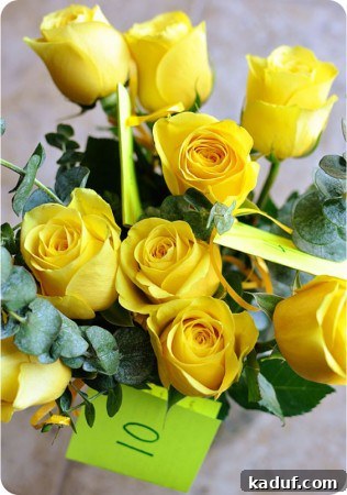 Celebrating a Decade: Our 10-Year Anniversary Roses A lovely bouquet of ten yellow roses, symbolizing a decade of enduring love and cherished memories, possibly an anniversary gift.