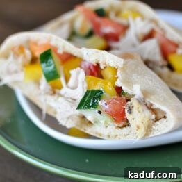 Effortless Slow Cooker Greek Chicken Pockets 4 Close up image of Greek Chicken Pita Pockets