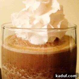 Chilled Chocolate Dream 4 Glass of frozen hot chocolate with whipped cream on top.